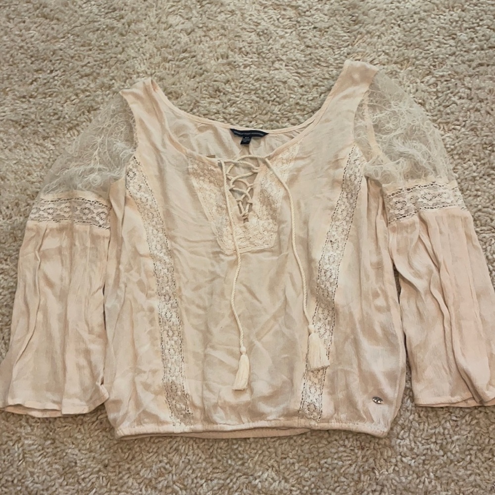 Cream colored lace blouse